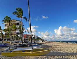 Small catamarans lined up on the Fort Lauderdale beach in Florida
